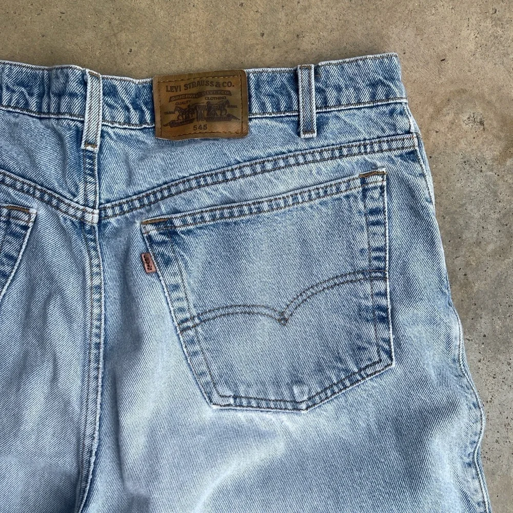 Vintage 90s 00s Levi’s 545 Brown Tab Jeans 40x36 loose fit light wash